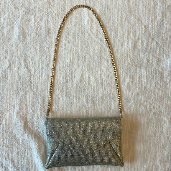 STUART WEITZMAN
The Loveletter Mini Metallic Clutch Bag - Picture 9 of 11